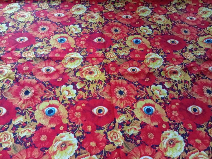Coupon de tissu imprimé polyester souple et doux motifs fleurs oranges yeux top qualité