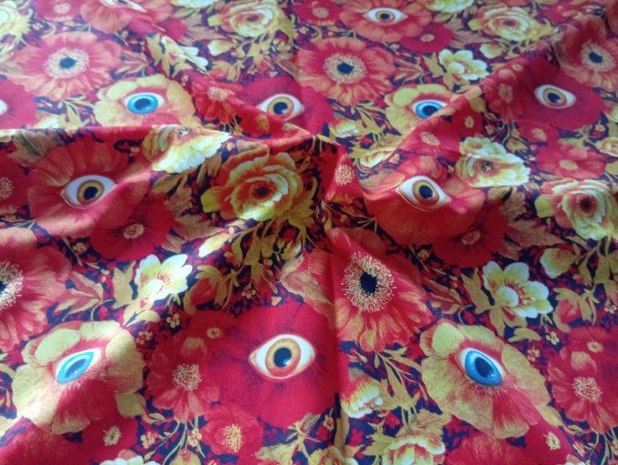 Coupon de tissu imprimé polyester souple et doux motifs fleurs oranges yeux top qualité