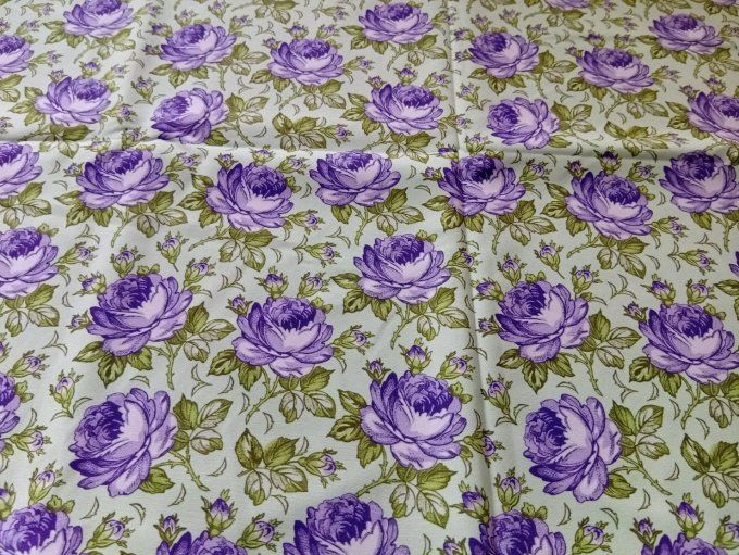 Coupon de tissu imprimé polyester souple et doux motifs fleurs mauves fond vert menthe top qualité