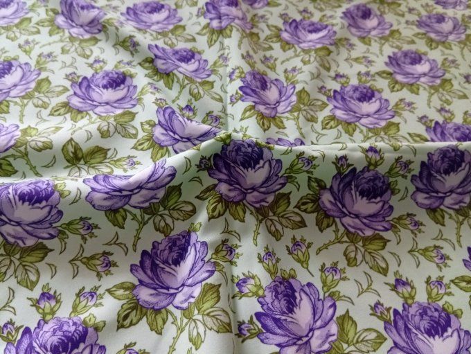 Coupon de tissu imprimé polyester souple et doux motifs fleurs mauves fond vert menthe top qualité